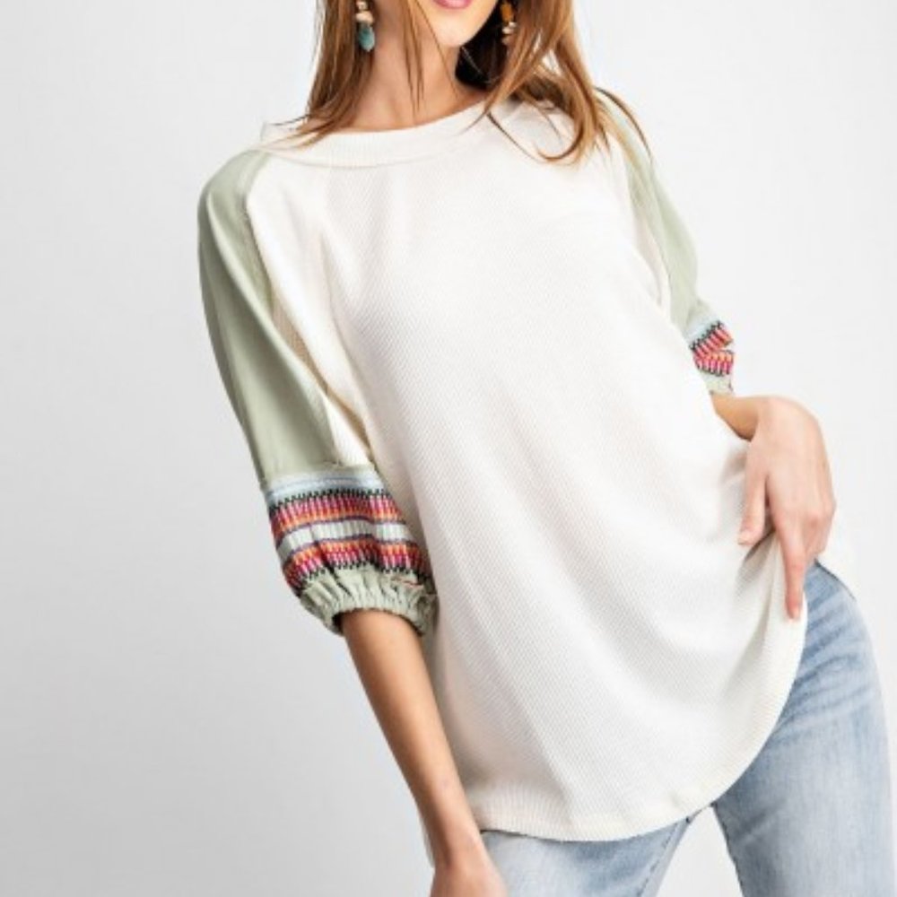 White waffle embroidered bubble sleeve top